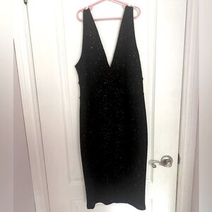 Sparkly black midi dress, the brand is Guess and it is a size XL